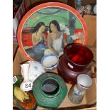 A cranberry glass jug, a portrait plaque and other assorted ceramics