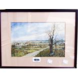 A framed watercolour depicting a rural landscape with trees and track in foreground and buildings