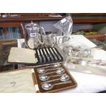 A silver plated BM three piece tea set, pierced tray, cased and loose cutley and a silver fork and
