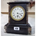 A late Victorian black slate and marble cased mantle timepiece with eight day movement