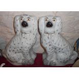 A pair of large Staffordshire spaniels - sold a pair of 19th Century bone china plates in the