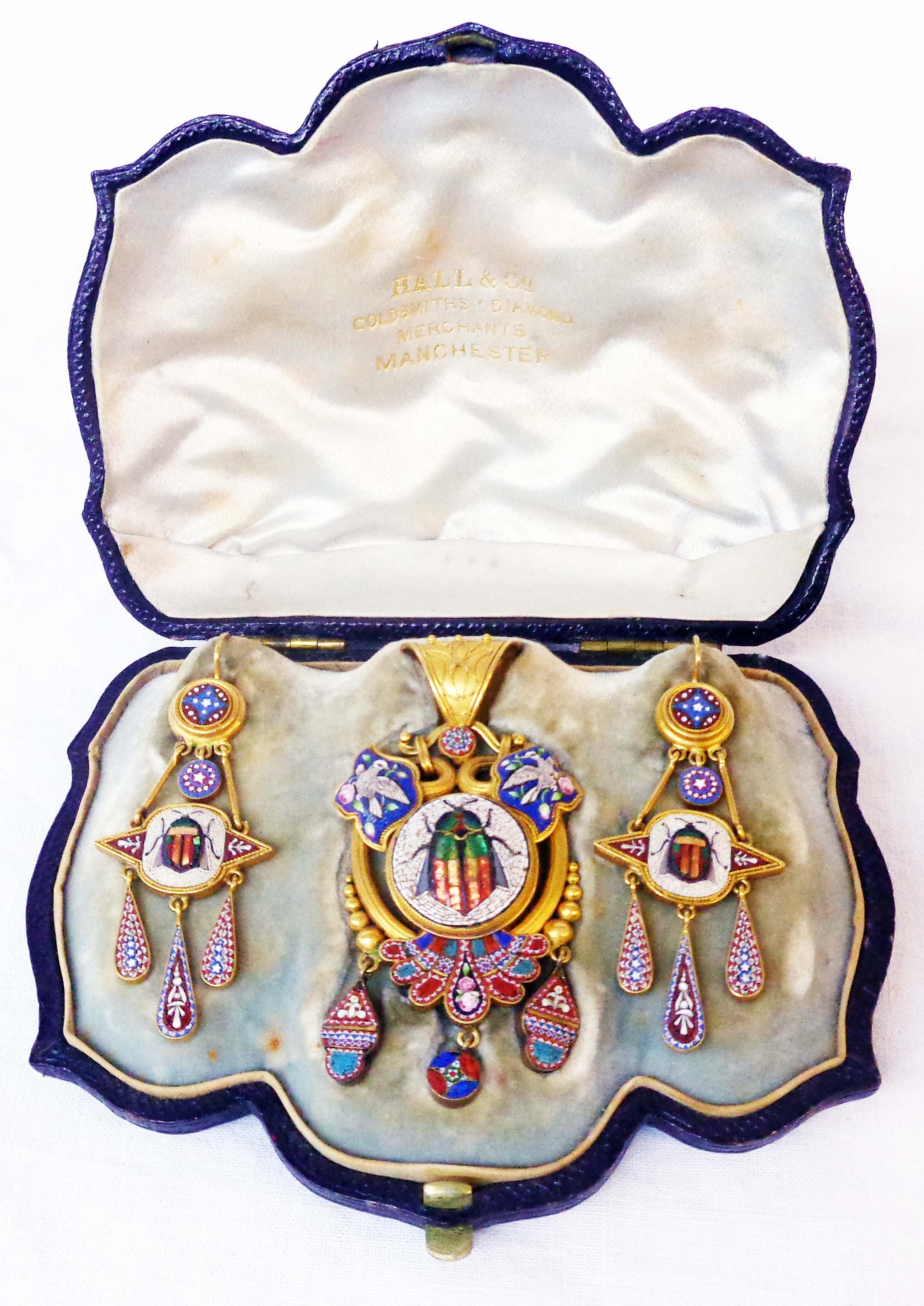 A 19th Century Grand tour suite of micro mosaic on yellow metal jewellery comprising of pendant
