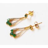 A pair of marked 375 gold drop ear-rings, set with small emeralds and diamonds