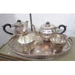 A four piece silver plated teaset on an associated silver plated copper oval gallery tray