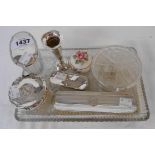 A glass dressing table tray containing silver topped jars, small specimen vase and damaged hair