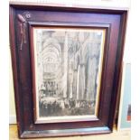 A large stained oak ecclesiastical framed monochrome print depicting a cathedral interior - signed