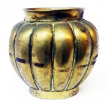 A small Chinese bronze ribbed pot with apocryphal four character mark to base