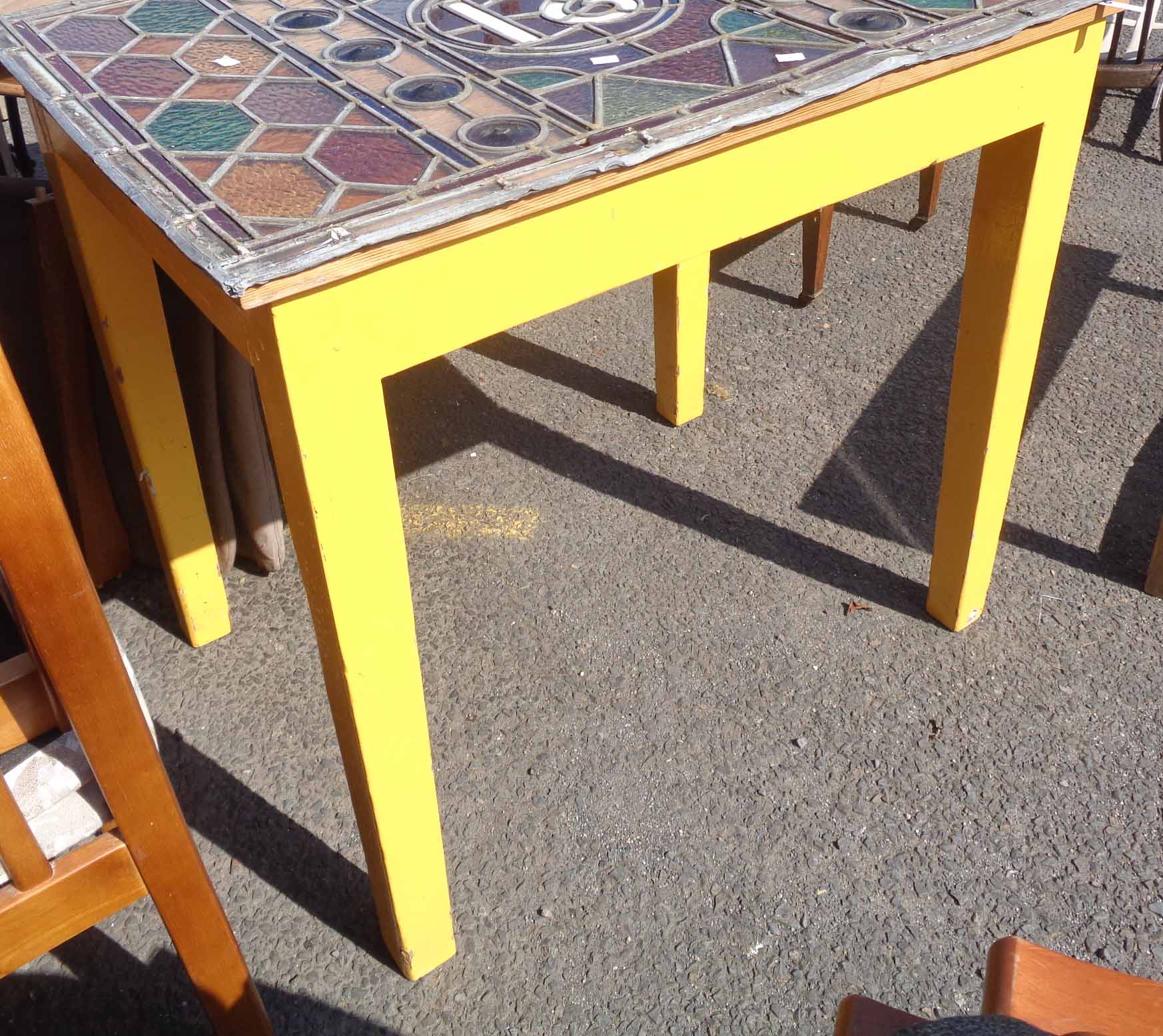 A pine table with stripped top and painted frame