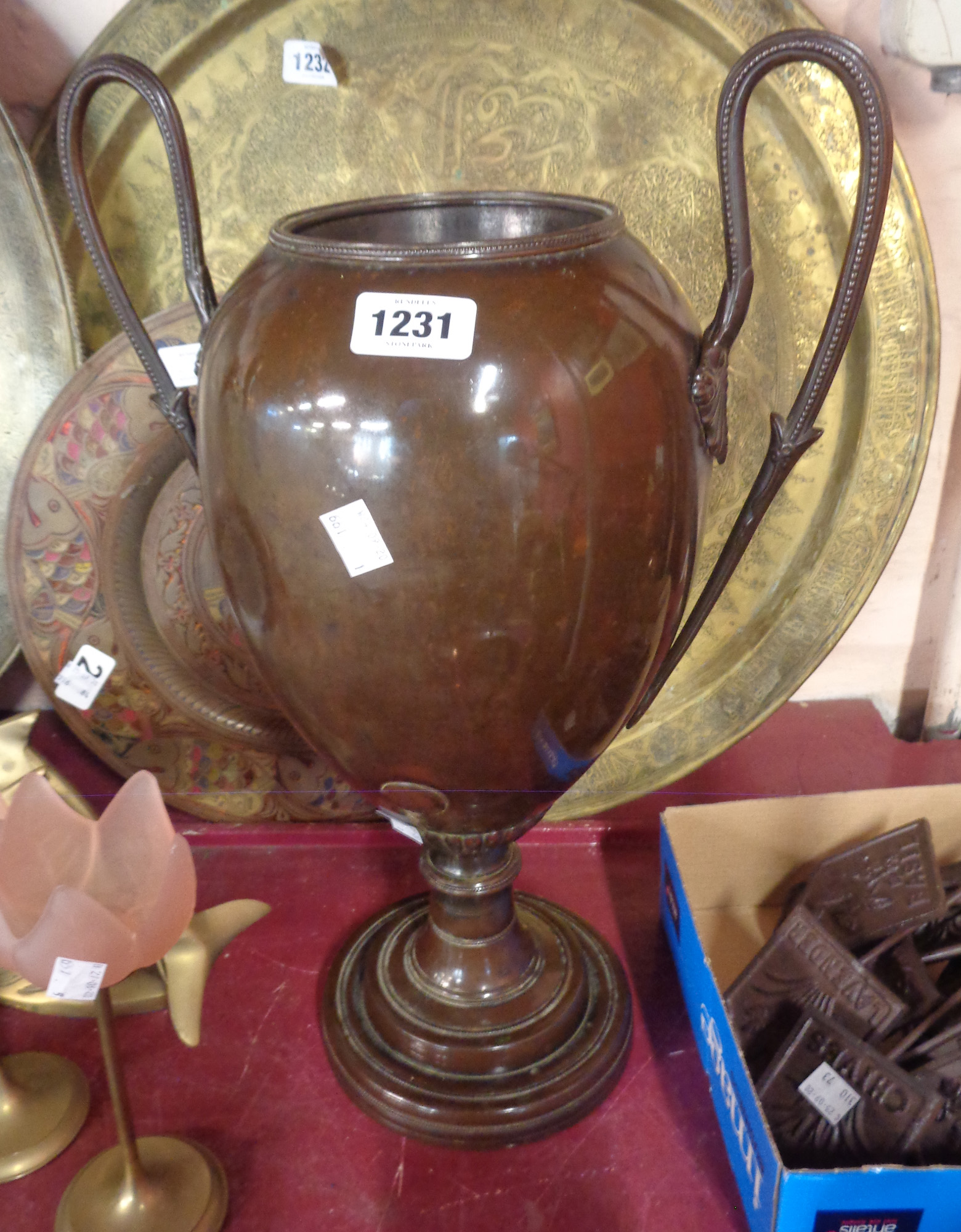 A large brass two handled urn convered from a samovar with bronzed patina - lid missing