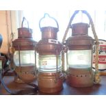 Three small vintage copper ships anchor lights