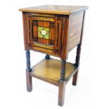 A 15 1/2" Aesthetic Movement pitch pine pot cabinet with decorative ebonised and painted floral