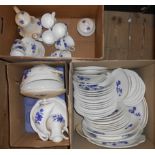 Three boxes containing a Gien part dinner service including plates, tureens, coffee set, etc.