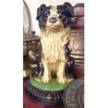 A reproduction painted cast iron collie dog doorstop