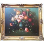 An ornate gilt framed modern oil on canvas still life with vase of flowers
