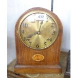 An early 20th Century stained wood cased wall clock with visible movement and Lenzkirch