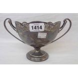 A 6 1/4" diameter Walker & Hall silver pedestal bowl with pierced rim and flanking cast loop handles