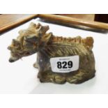 A small antique Chinese pottery dragon