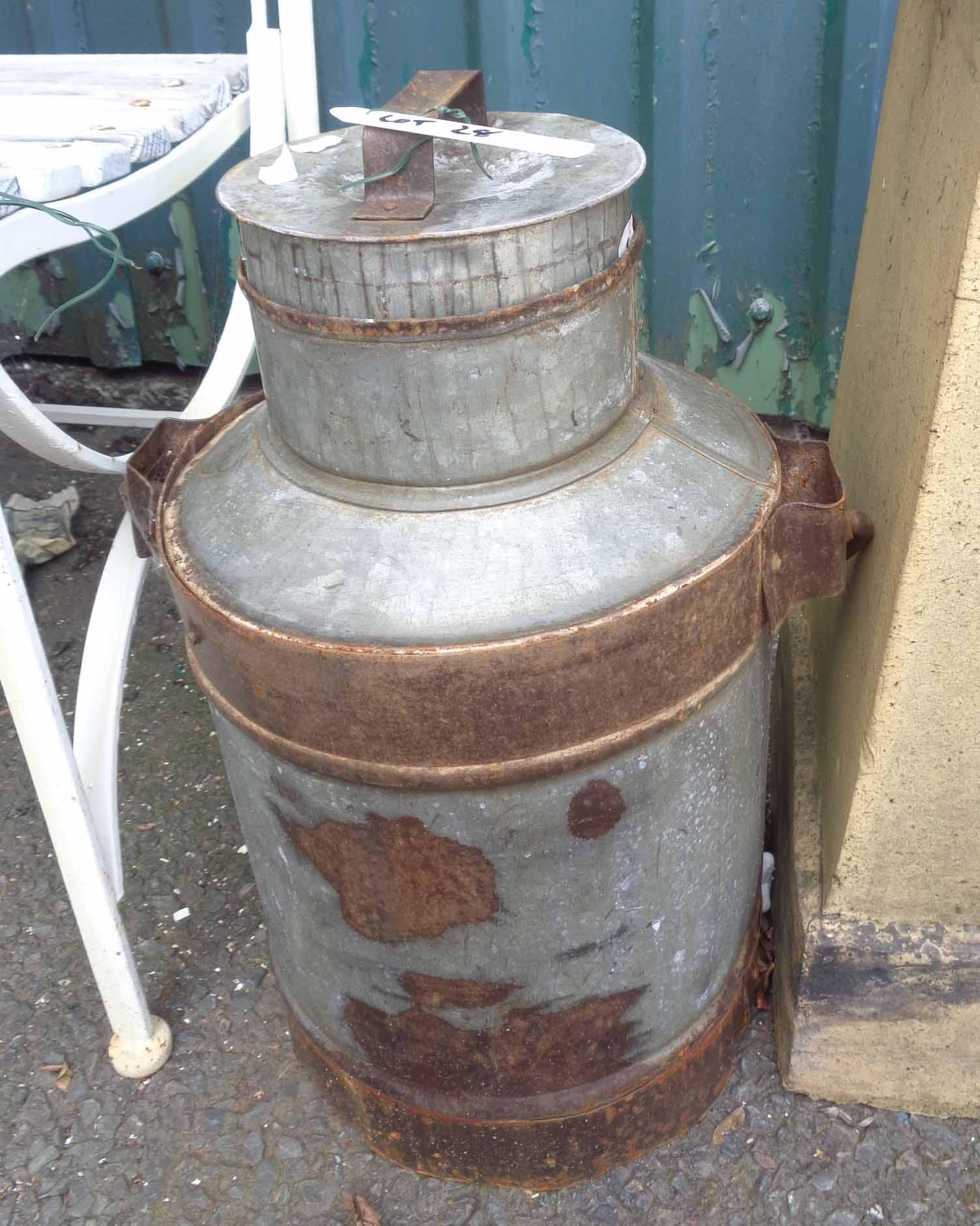 An 18" high milk churn