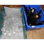 A box of glass and a box of pottery A box of assorted glasses and a box of vintage bottles