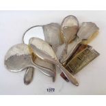 Various silver backed brushes and combs also three silver backed hand mirrors - various age and