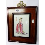 A 20th Century Chinese porcelain famille rose panel depicting a court figure in flowing robes, in
