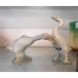 A Lladro Standing Goose and Angry Goose figures with Lladro retail bag