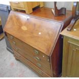 A 3' 6" 19th Century inlaid mahogany bureau with fully fitted secret, other drawer and pigeon hole