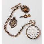 A white metal cased back wind lever pocket watch, on English silver kerb-link watch chain with two