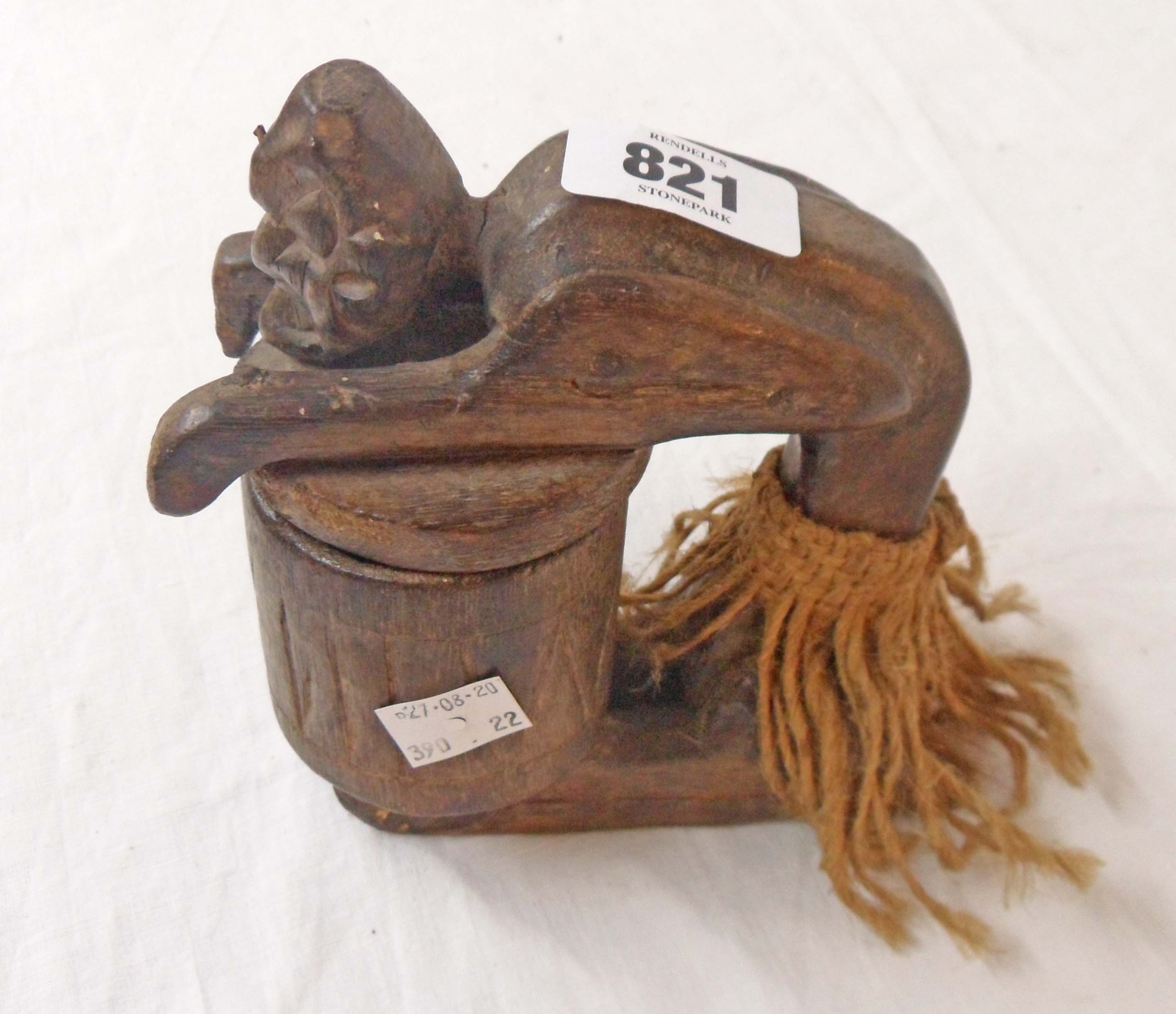 A vintage African carved wooden hinge-lidded container