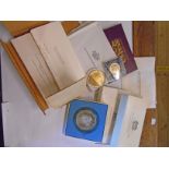 A collection of presentation coin sets including 1975 Papua New Guinea, 1970 and 1971 Great