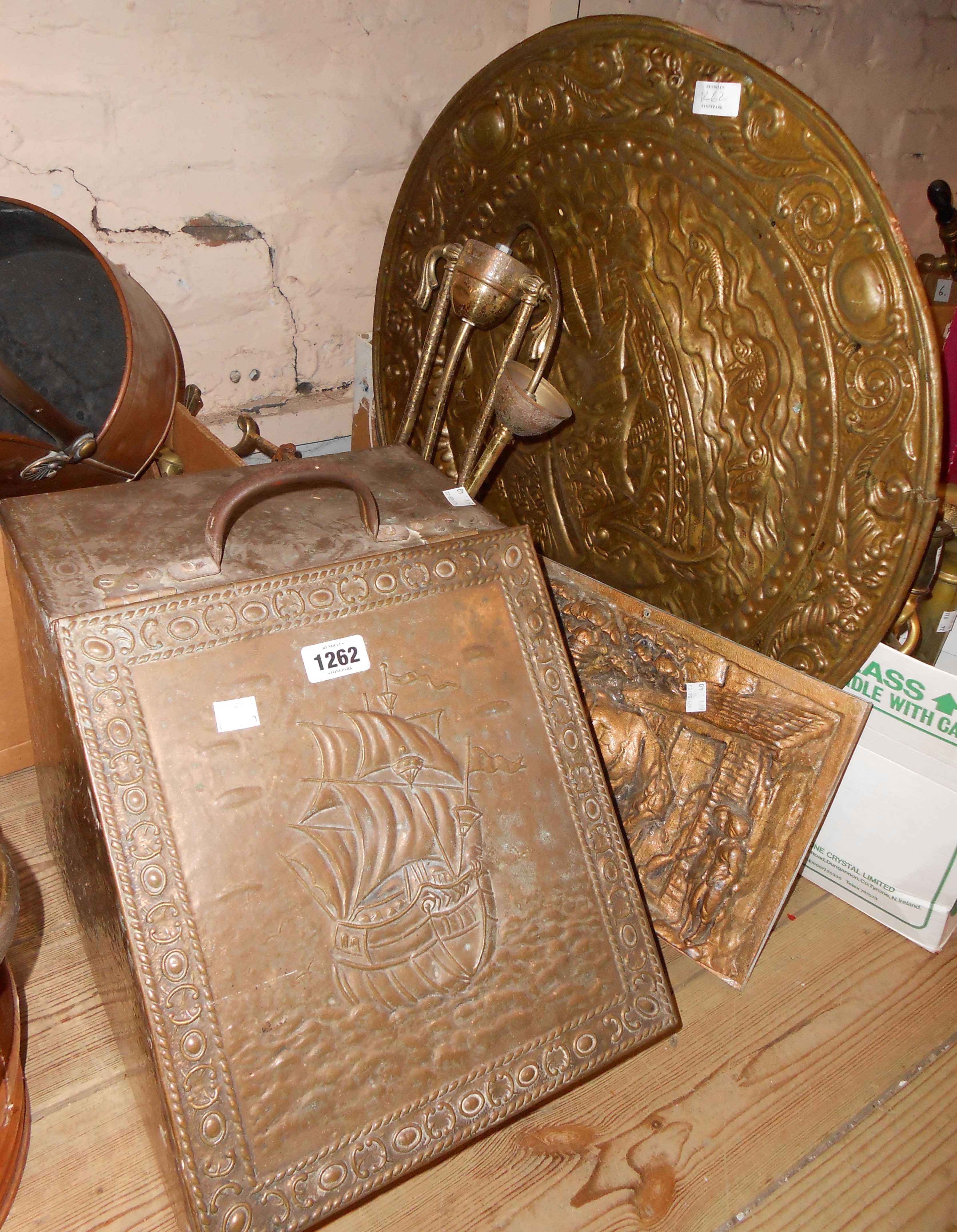An embossed brass coal box, brass charger, hangling light, aluminum plaque, etc.