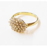 An import maked 750 gold diamond cluster ring - 0.5ct. TDW