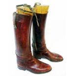 A pair of vintage brown leather riding boots & wooden trees
