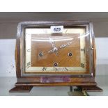 A 1930's polished oak cased mantel clock with Enfield eight day gong striking movement -