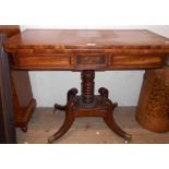 A 36" 19th Century mahogany and cross banded fold-over card table with beaded frieze, set on ring