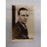 A signed photographic postcard of Sir John Geilguid