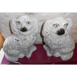 A pair of Staffordshire spaniels - one a/f