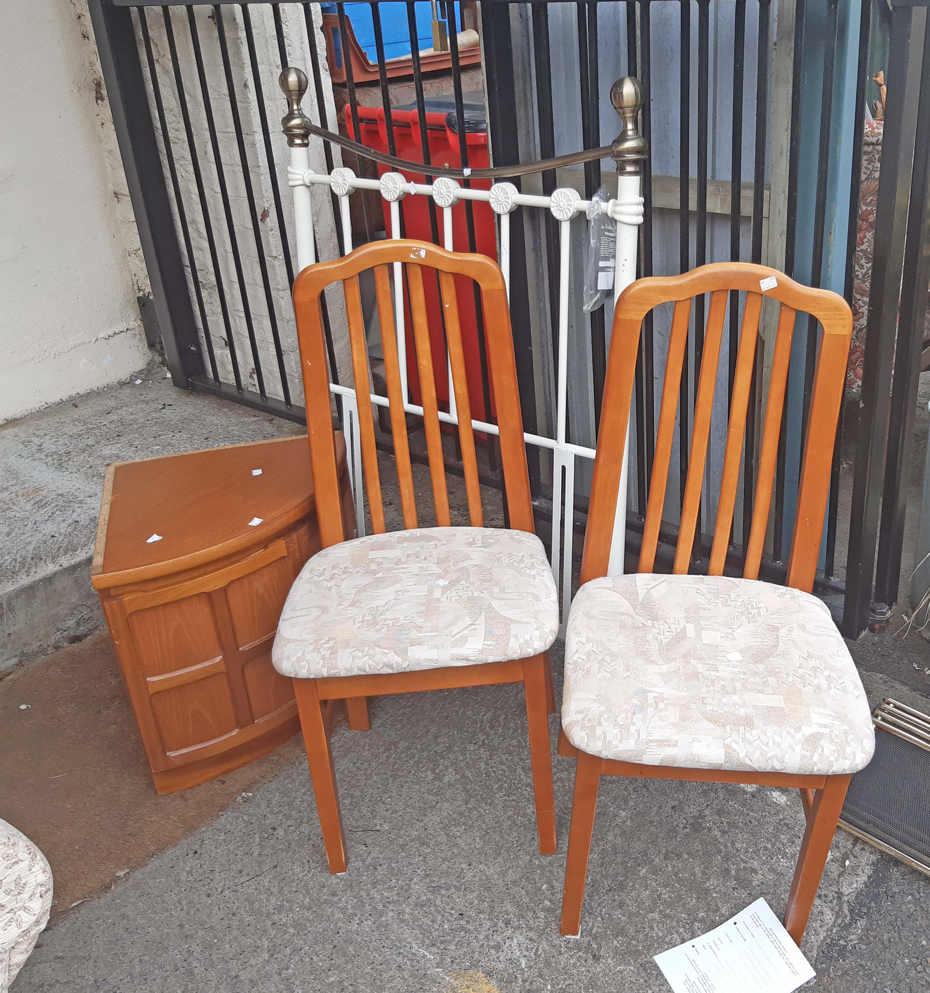 A pair of modern dining chairs, a reduced Nathan corner unit, and a single headboard