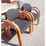A set of four 20th Century bentwood framed and upholstered stacking chairs