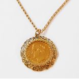A 1912 Deutsches Reich 10 Mark gold coin, claw set in a pendant mount, on marked 9k chain - deep
