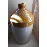 A large stoneware flagon for Slade & Sons, Abbey Stores Torquay