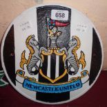 A painted iron Newcastle United sign