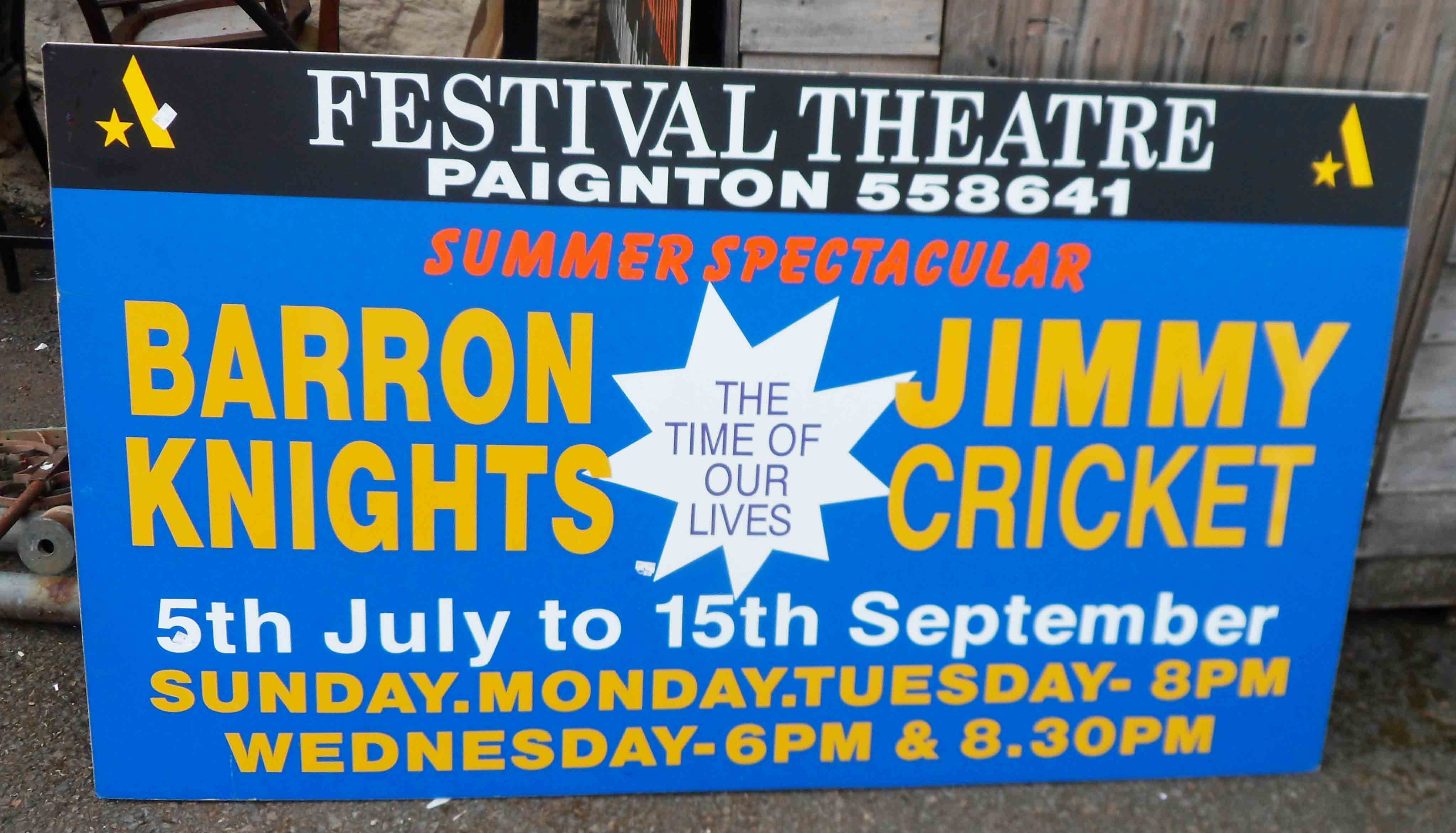 Two theatre advertising signs for the Festival Theatre Paignton