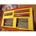 A circa 1960 Tri-Ang boxed train set with locomotive, two carriages, and track
