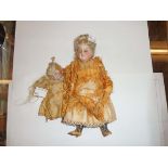 Two old porcelain headed dolls