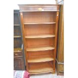 A 36" reproduction mahogany Edwardian style bow front five shelf open bookcase with dentil