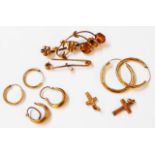 A small collection of yellow metal hoop ear-rings, two small crosses, floral brooch and pin