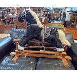 A Mamas & Papas plush rocking horse