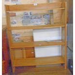 A 30" retro stained wood four shelf open bookcase with tapered standard ends - bottom shelf braced
