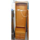 A 20 1/2 " Nathan Furniture teak effect drinks cabinet with shelf, locking door, recess and panelled